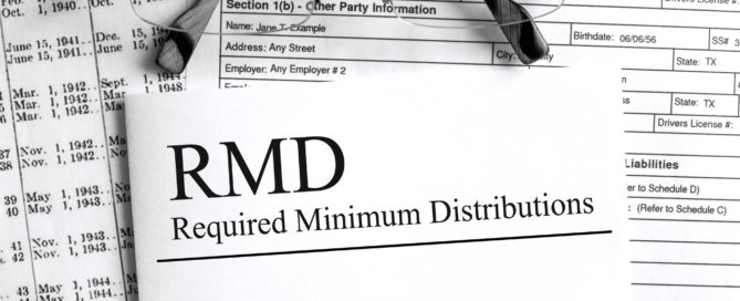 Paper with text RMD Required Minimum Distributions on a table