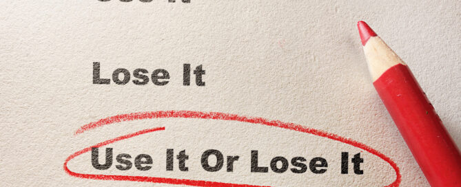 Red circle and pencil with Use It Or Lose It text -- exercise concept